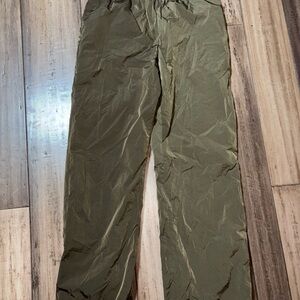 Good American women’s nylon goldish brown windbreaker pants